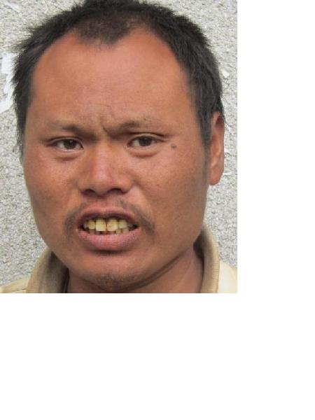 流浪人员欧共宜照片，让爱回家