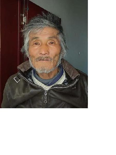 流浪人员化万明照片，让爱回家