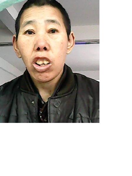 流浪人员党红莲照片，让爱回家