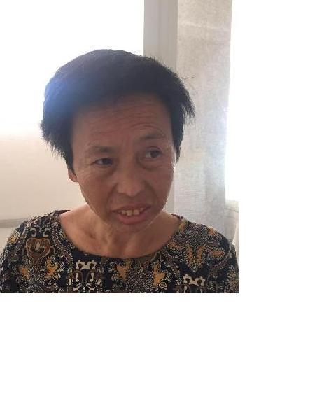 流浪人员龙春阳照片，让爱回家