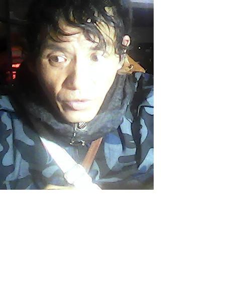 流浪人员王阿南（音）照片，让爱回家