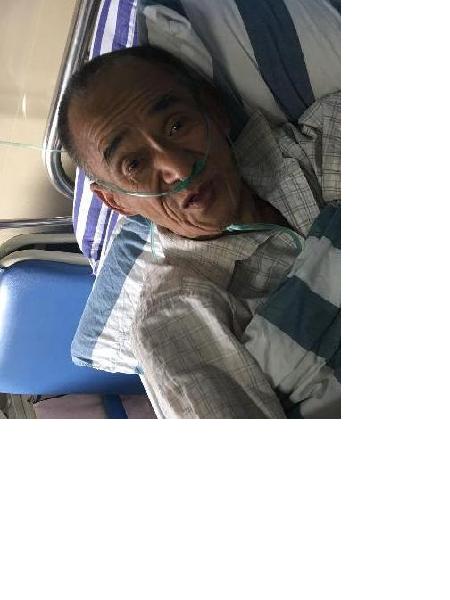 流浪人员唐光华照片，让爱回家