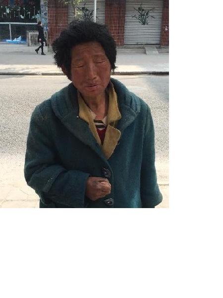 流浪人员苟小琼照片，让爱回家