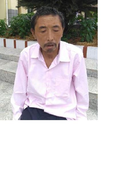 流浪人员涂建中（音）照片，让爱回家