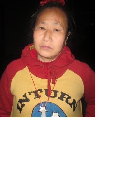 流浪人员毛玉兰照片，让爱回家