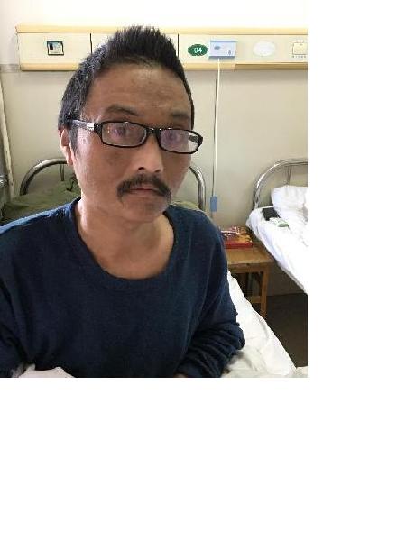 流浪人员李明照片，让爱回家
