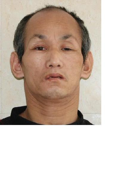 流浪人员滕建宏照片，让爱回家
