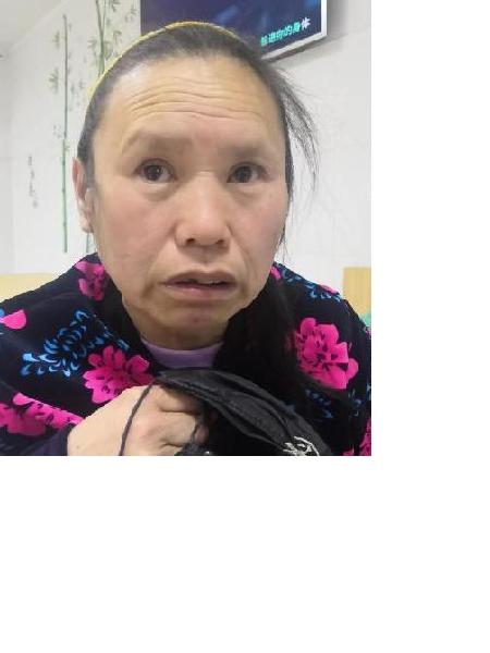 流浪人员李药飞照片，让爱回家