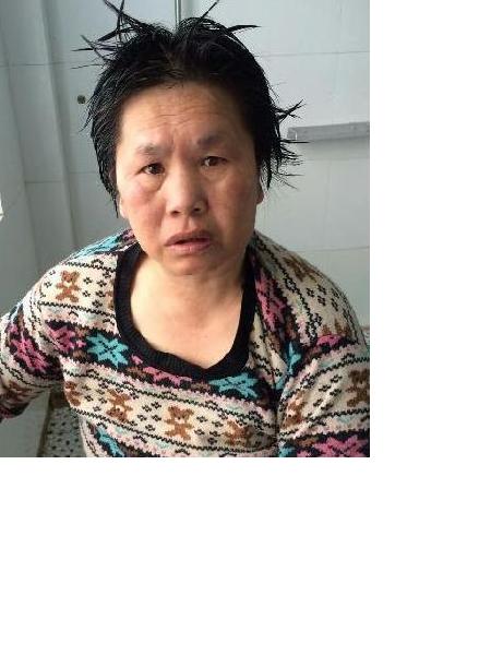 流浪人员张明芳照片，让爱回家
