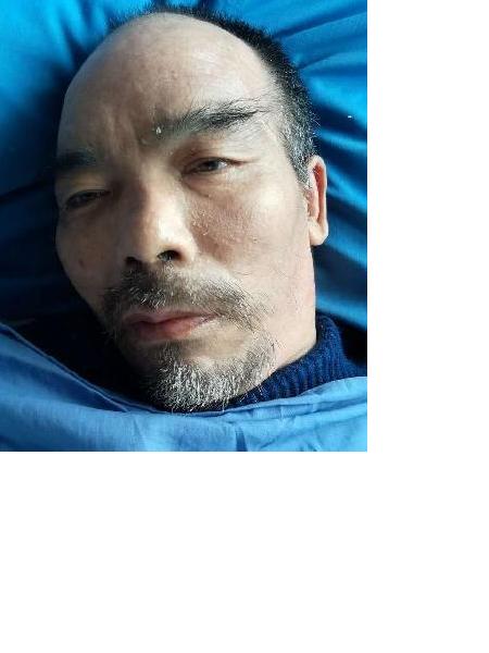 流浪人员何大剑照片，让爱回家