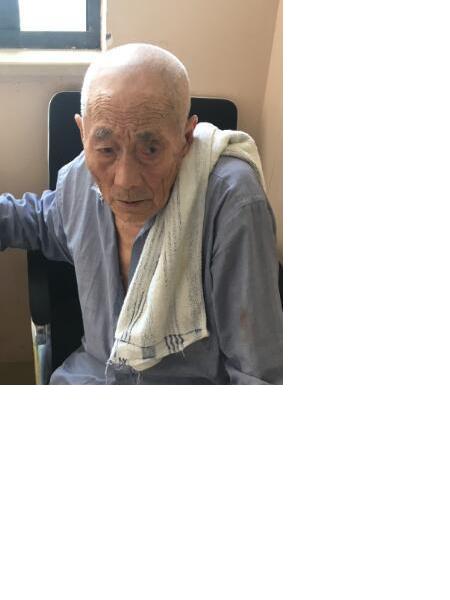 流浪人员吴救沭照片，让爱回家