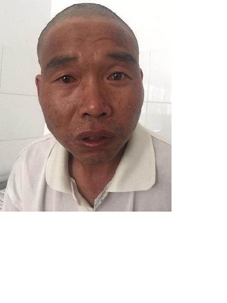 流浪人员童金华（站取）照片，让爱回家