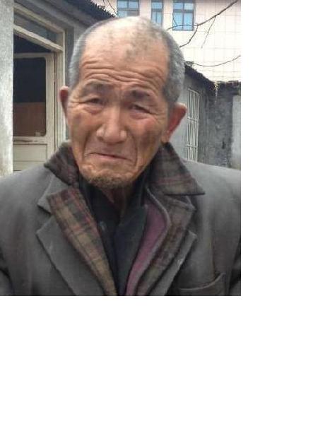 流浪人员杨梁山照片，让爱回家