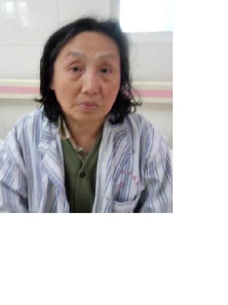 流浪人员李光英照片，让爱回家