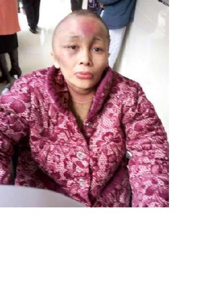 流浪人员石子兑英照片，让爱回家