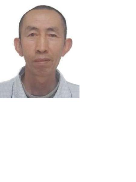 流浪人员殷树亮照片，让爱回家