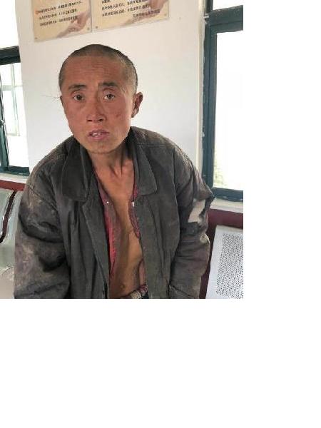 流浪人员张辉照片，让爱回家