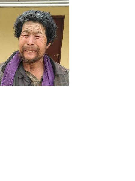 流浪人员刘万能（音）照片，让爱回家