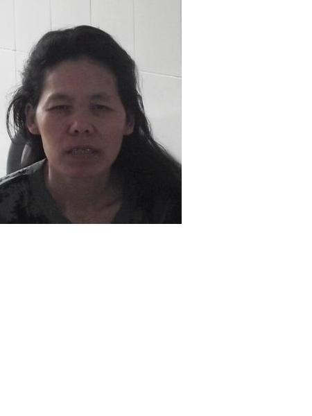 流浪人员李木兰（音）照片，让爱回家