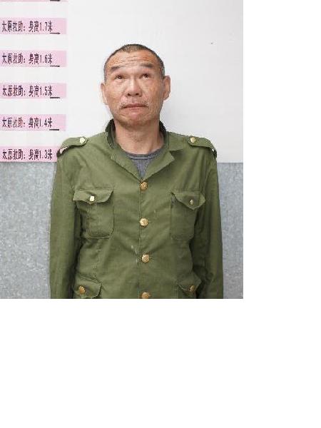 流浪人员弓建民照片，让爱回家