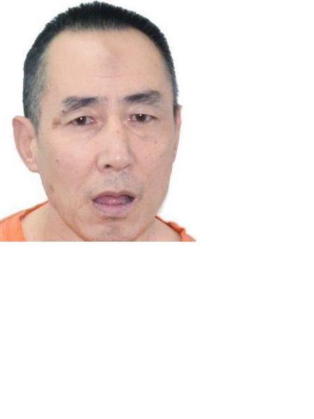流浪人员吴阳照片，让爱回家