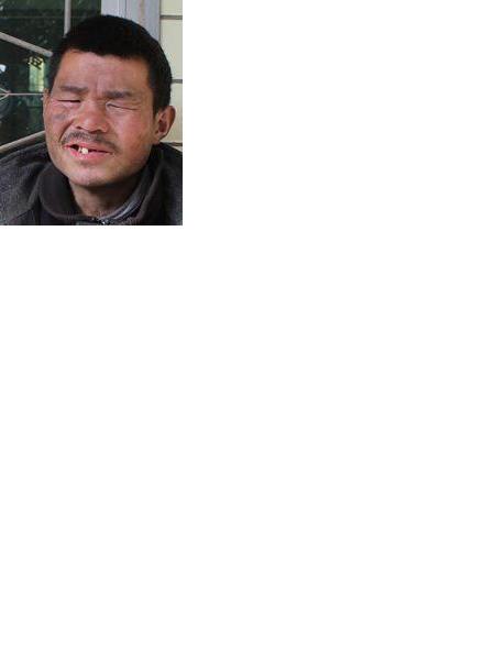 流浪人员张提照片，让爱回家