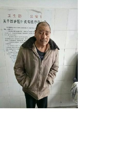 流浪人员吴明洋照片，让爱回家