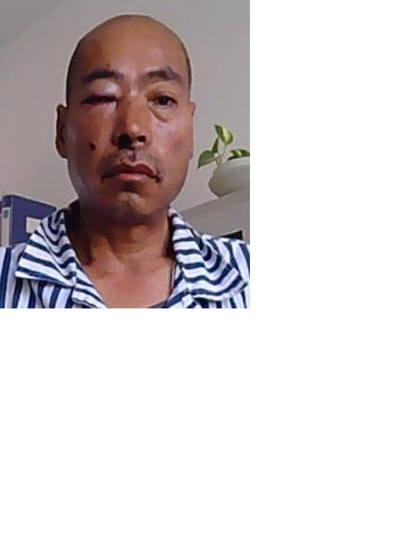 流浪人员郜志龙照片，让爱回家