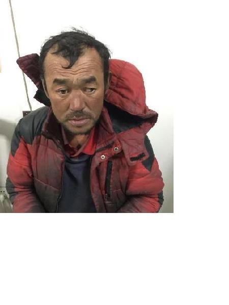 流浪人员赛来克白·克孜尔照片，让爱回家