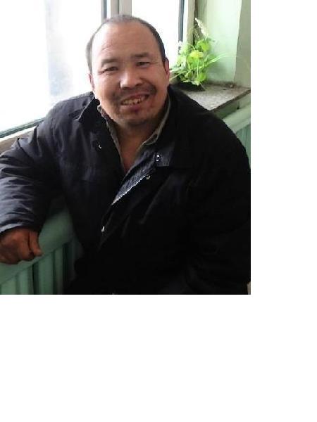流浪人员李春生照片，让爱回家