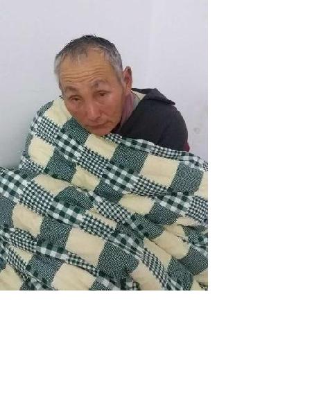 流浪人员石明勇照片，让爱回家