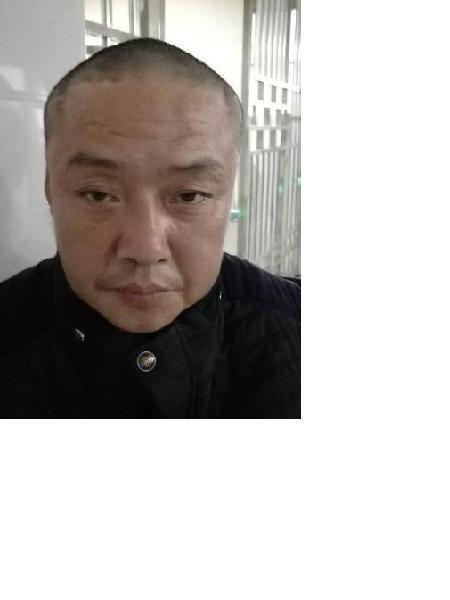流浪人员谭道祥照片，让爱回家