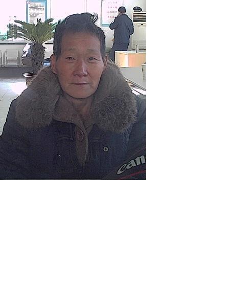 流浪人员于爱英照片，让爱回家