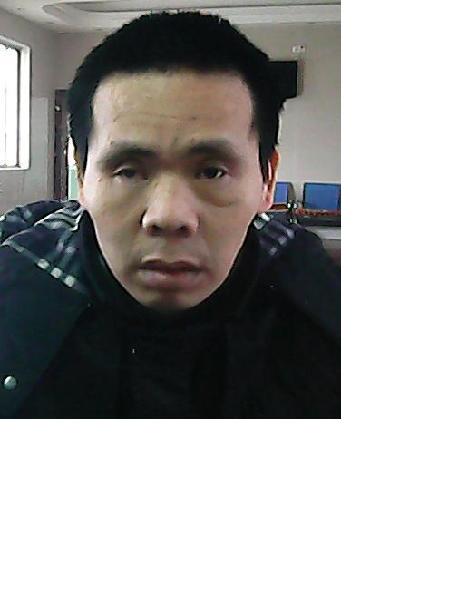 流浪人员杨明学照片，让爱回家