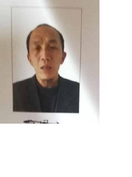流浪人员杨启民照片，让爱回家