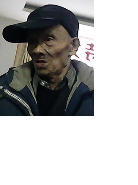 流浪人员何金良照片，让爱回家