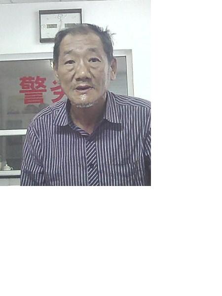 流浪人员张力永照片，让爱回家