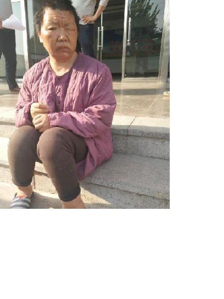 流浪人员秦玲照片，让爱回家
