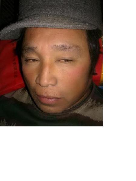 流浪人员谭明雪照片，让爱回家