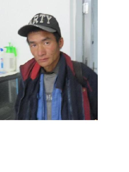 流浪人员吴明德照片，让爱回家