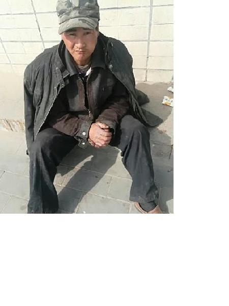 流浪人员李东平照片，让爱回家
