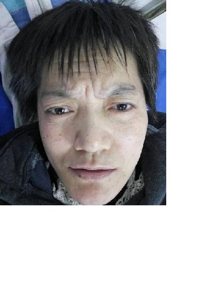 流浪人员陶金霞照片，让爱回家