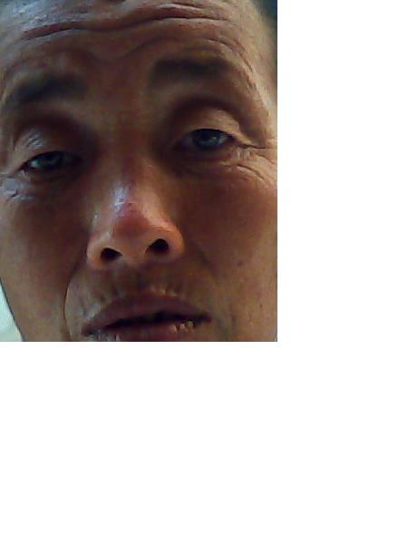 流浪人员胡运兰照片，让爱回家